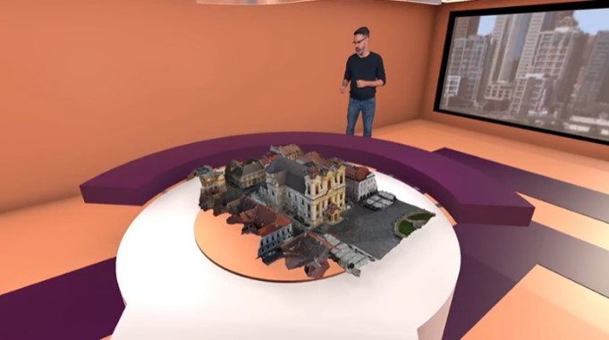 Figure 8_XReco_3D Productions XReco_Nico presenting a 3D recreation of the St George Cathedral (Timișoara) in the virtual studio.